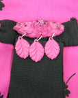 close up detail of attached brooch on 40s shirt