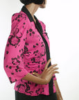 view showing ruched bodice seaming of 40s pink and black top
