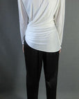 back view, 80s Dynsaty style draped jumpsuit with strong shoulders