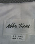 80s dramatic jumpsuit label, Abby Kent