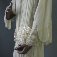 another detail view, layered chiffon sleeve with pleating 