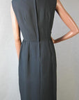 back view, 1960s black sleeveless sheath office to cocktail