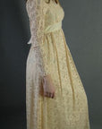 side view, 70s long sleeved lace dress with empire waist
