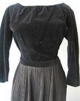 close up of 50s bodice, long sleeved black velveteen blouse top
