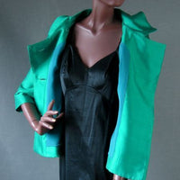 60s emerald green jacket showing turquoise lining