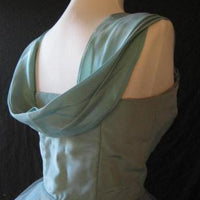 back view of 50s prom dress bodice, showing removable draped swag