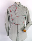 men's western shirt showing bib front part way removed