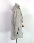 side view, 60s gray western shirt with red trim bib front