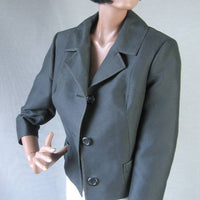 60s black Chanel style suit jacket, open