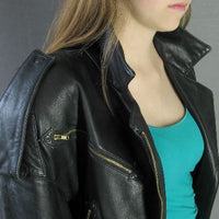 close up details, padded shoulders with epaulettes and multiple zippers, 80s moto jacket