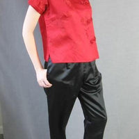 another view, red Chinese brocade top with black satin pants