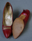 overhead view of 50s 60s red stilettos showing inside and soles