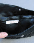 inside, black satin beaded clutch bag