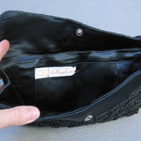 inside, black satin beaded clutch bag