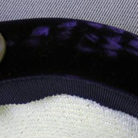 closeup purple velvet hat brim
