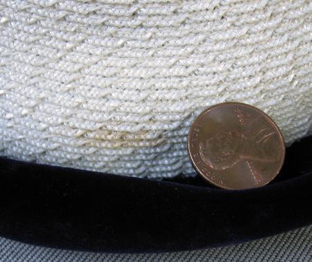 closeup of small flaw on straw of hat