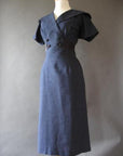 50s vintage fitted cocktail dress with double breasted bodice