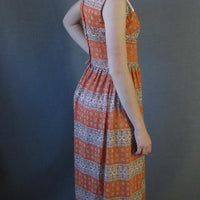 side view, sleeveless paisley stripe 70s maxi dress