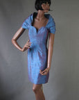 1980s bombshell mini dress in shimmering turquoise sharkskin