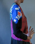 side view of cropped 80s jacket, pieced prints