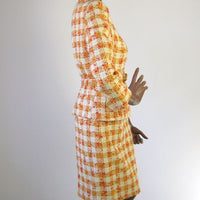 side view, 60s orange plaid skirt suit with belted jacket
