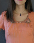 empire waist bodice, embellished with beads and pearls