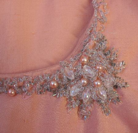 close up details, pearl and bead embellishemnt at neckline of 60s dolly dress