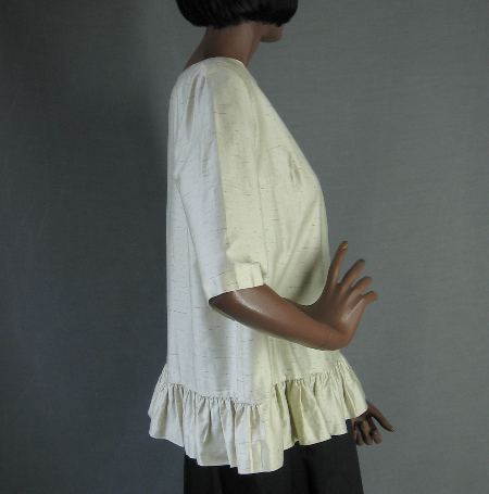 side view, womens vintage blouse ruffled hem 1950s