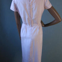 back view of 50s pale pink sheath dress