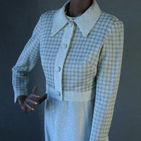 close up view 70s silver and white cropped houndstooth jacket with big collar