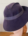 brimmed 30s hat showing low crown with slashed and stitched design element
