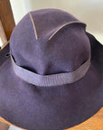 another view of low crown, shaped with slashing and stitching