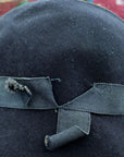 close up view, slight fray to outer ribbon band edges