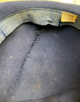 inside view of age related changes to hatband and closeup of shaping stitches