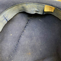 inside view of age related changes to hatband and closeup of shaping stitches
