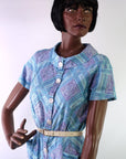 1950s vintage day dress with buttoned cowl neckline
