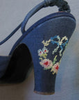 close up of needlepoint embroidery on back of heel, 1950s slingback heels