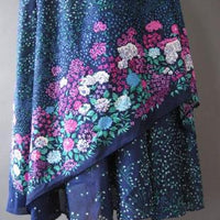 close up detail, angled border print floral skirt