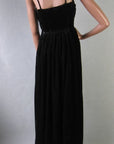 back view, strappy black velvet evening gown