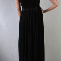 back view, strappy black velvet evening gown