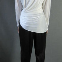 back view, 80s Dynsaty style draped jumpsuit with strong shoulders
