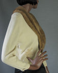 side view, cropped cashmere cardigan in cream with mink collar