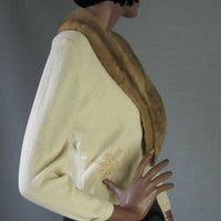 side view, cropped cashmere cardigan in cream with mink collar