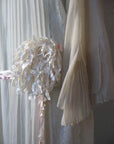 20s wedding dress close up detail, large ribbon flower accent