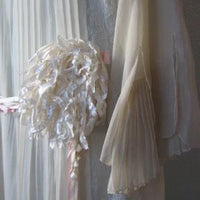 20s wedding dress close up detail, large ribbon flower accent
