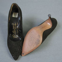 overhead view of brown suede cutwork stilettos heels and soles