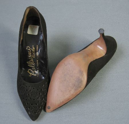 overhead view of brown suede cutwork stilettos heels and soles