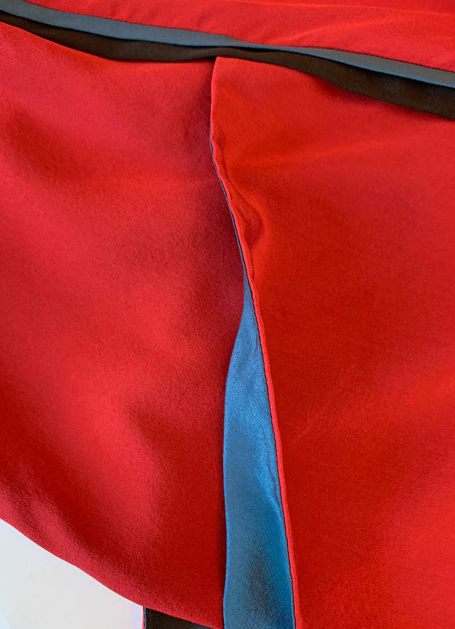 another close up, 80s red silk dress with black and teal accents