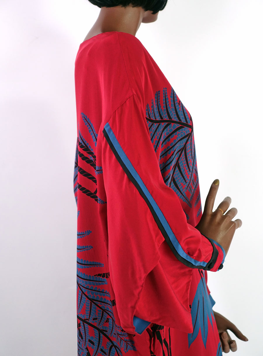 side view of kimono sleeves on 80s red silk dress