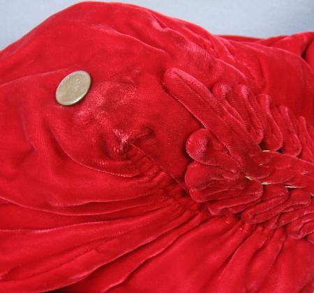 close up of another small flaw, 40s red velvet jacket